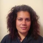 A woman with curly dark hair before makeover