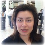 Woman with dark hair at a salon before makeover